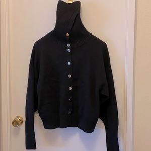 Women’s Black sweater.